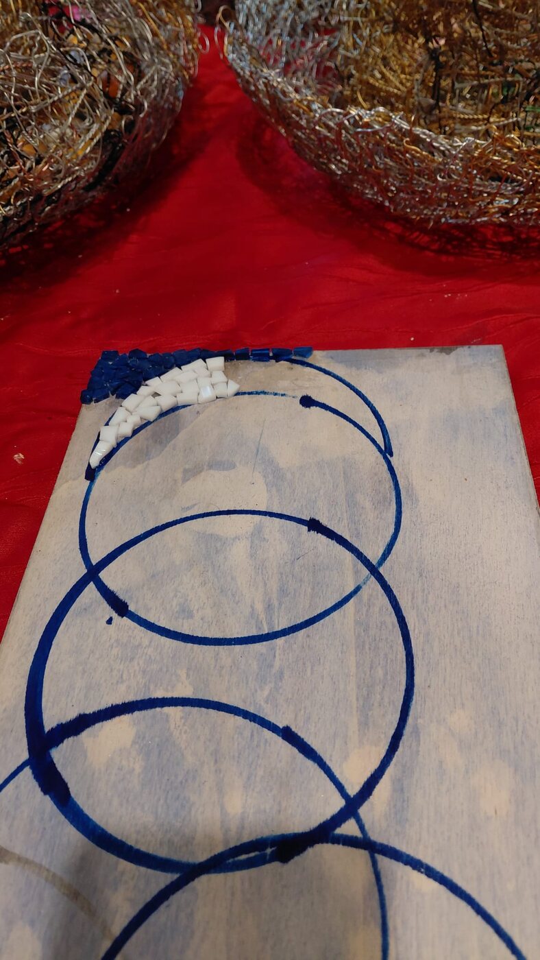 The outline drawn on wood before the tesserae go down