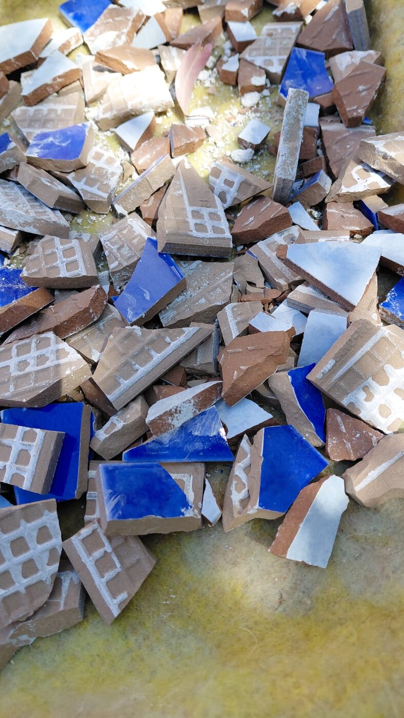 Tile fragments sorted by colour